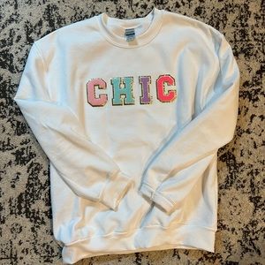 Judith March sweatshirt. Never worn. Size Medium.